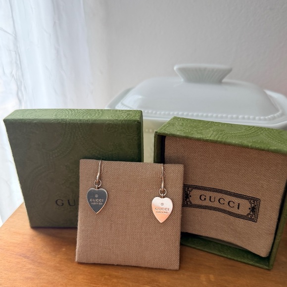 Gucci Jewelry - Authentic Gucci dangling heart earrings